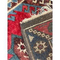 Turkish red ground runner, seven star and leaf decorated medallions, geometric design repeating border