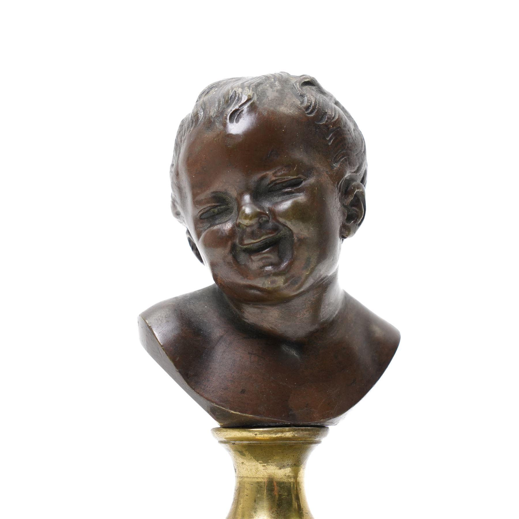 After Jean Antoine Houdon (French 1741-1828): 'Jean qui pleure' and 'Jean qui rit', laughing and crying busts of a boy on circular marble base, H11cm