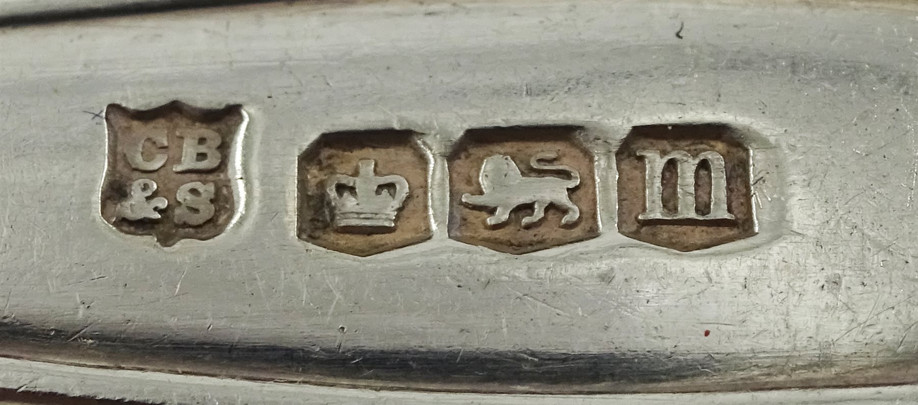 Pair of silver christening spoons by Cooper Brothers & Sons Ltd, Sheffield 1929 cased, four silver teaspoons and coffee spoon stamped sterling, silver napkin ring and six coffee bean spoons, hallmarked