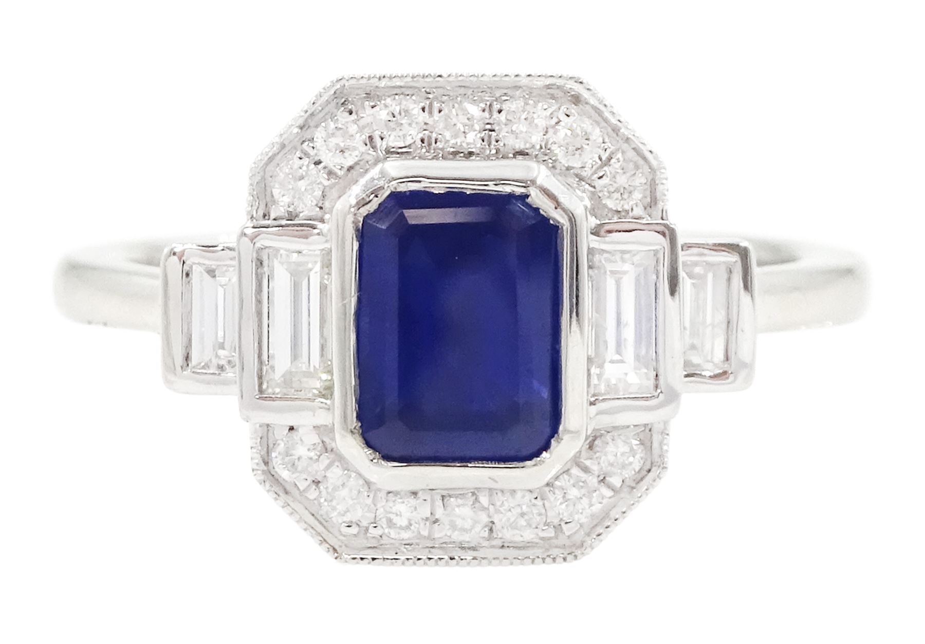Platinum sapphire and diamond ring, single octagonal cut sapphire of approx 1.15 carat, flanked by two baguette cut diamonds and milgrain set round brilliant cut diamond surround, hallmarked, total diamond weight approx 0.35 carat