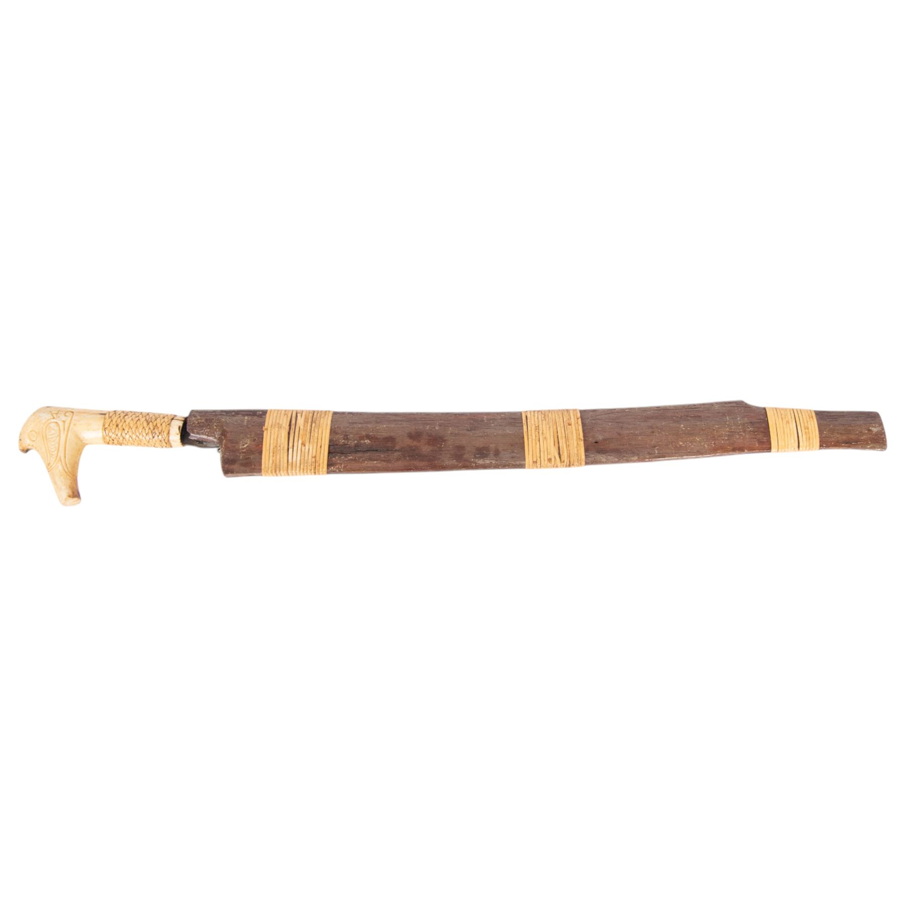 Borneo Dayak Mandau knife, with carved bone handle and wooden scabbard, overall L64cm