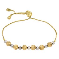 18ct white and yellow gold textured bead bracelet, stamped 750