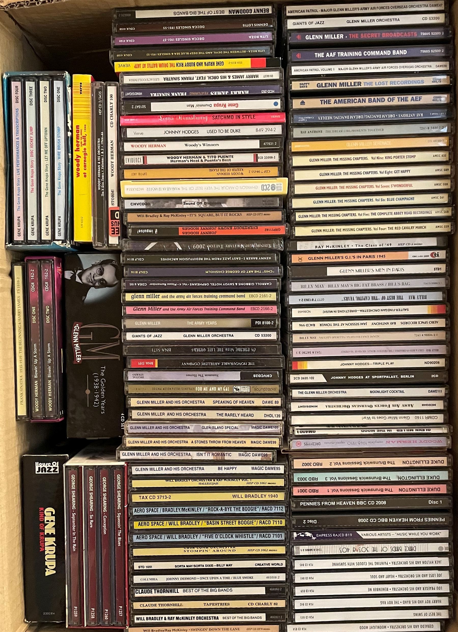 A large collection of mostly Jazz CD's including Glenn Miller, Gene Krupa, Duke Ellington, Stan Kenton, Benny Goodman and other music in four boxes (400+)
