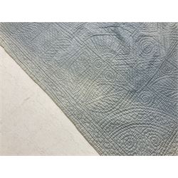Early 20th century Welsh whole cloth sky blue quilt, in traditional quilting patterns, supported on yellow coloured backing, 174cm x 204cm