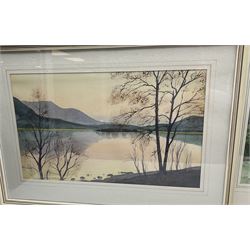 Norman Jackson (British 20th century): Sunset Lake Landscape and Flatland Landscape with Hilly Scene, pair watercolours together with a smaller by the same hand, signed max 31cm x 51cm (3)