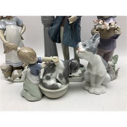 Five Lladro figures, including The Lamp Lighter no 5205,  Girl and Kittens no 6102, Cat no 5113 etc