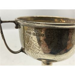 1930's silver twin handled trophy cup, upon black circular plinth, hallmarked Birmingham 1936, approximate silver weight 47 grams
