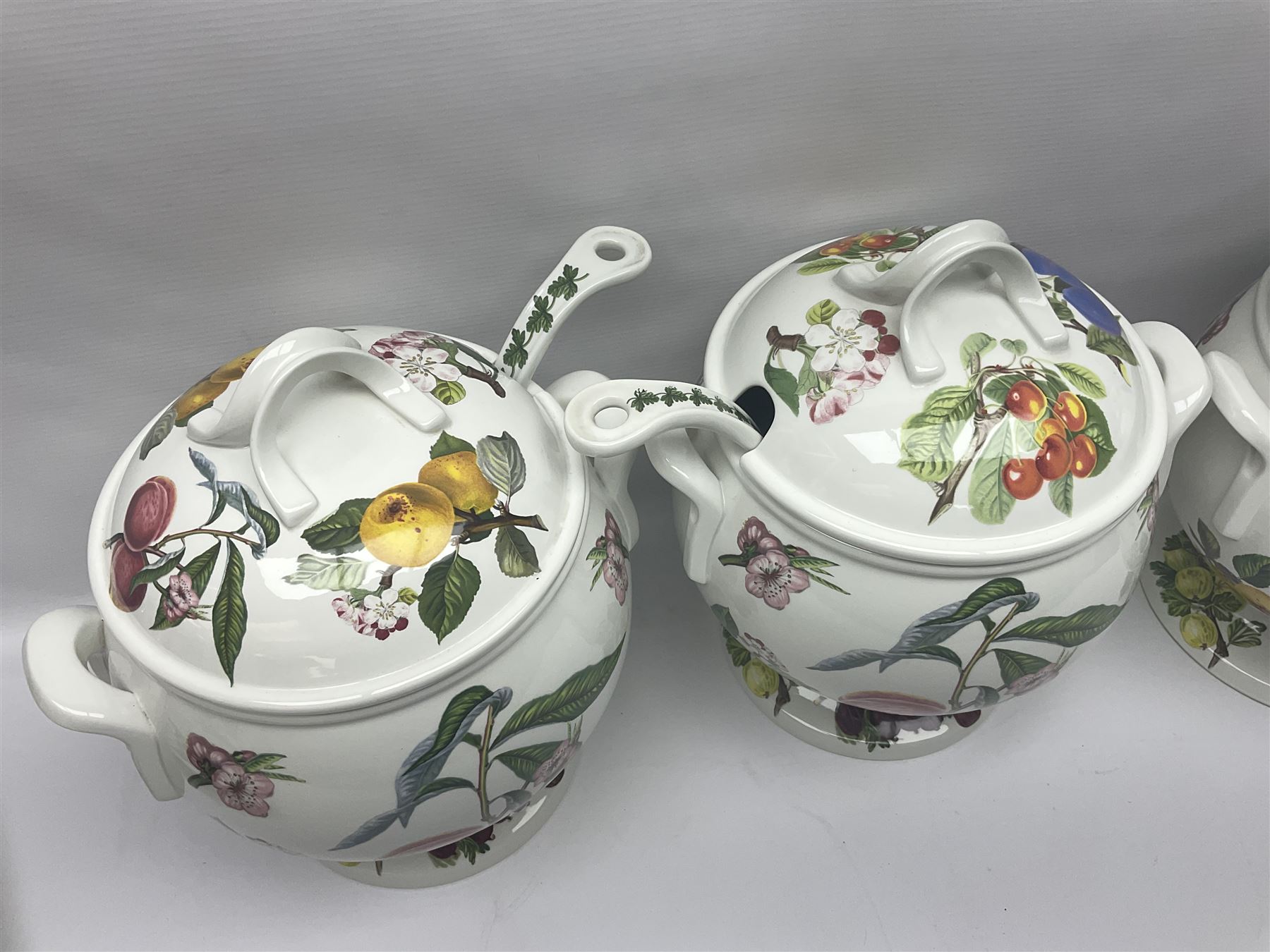 Three Portmeirion soup tureens with covers and ladles, together with vases, large bowls and other Portmeirion items