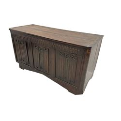 20th century oak blanket box, hinged lid over linen-fold front