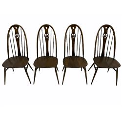 Ercol dark elm drop leaf dining table and four swan back chairs