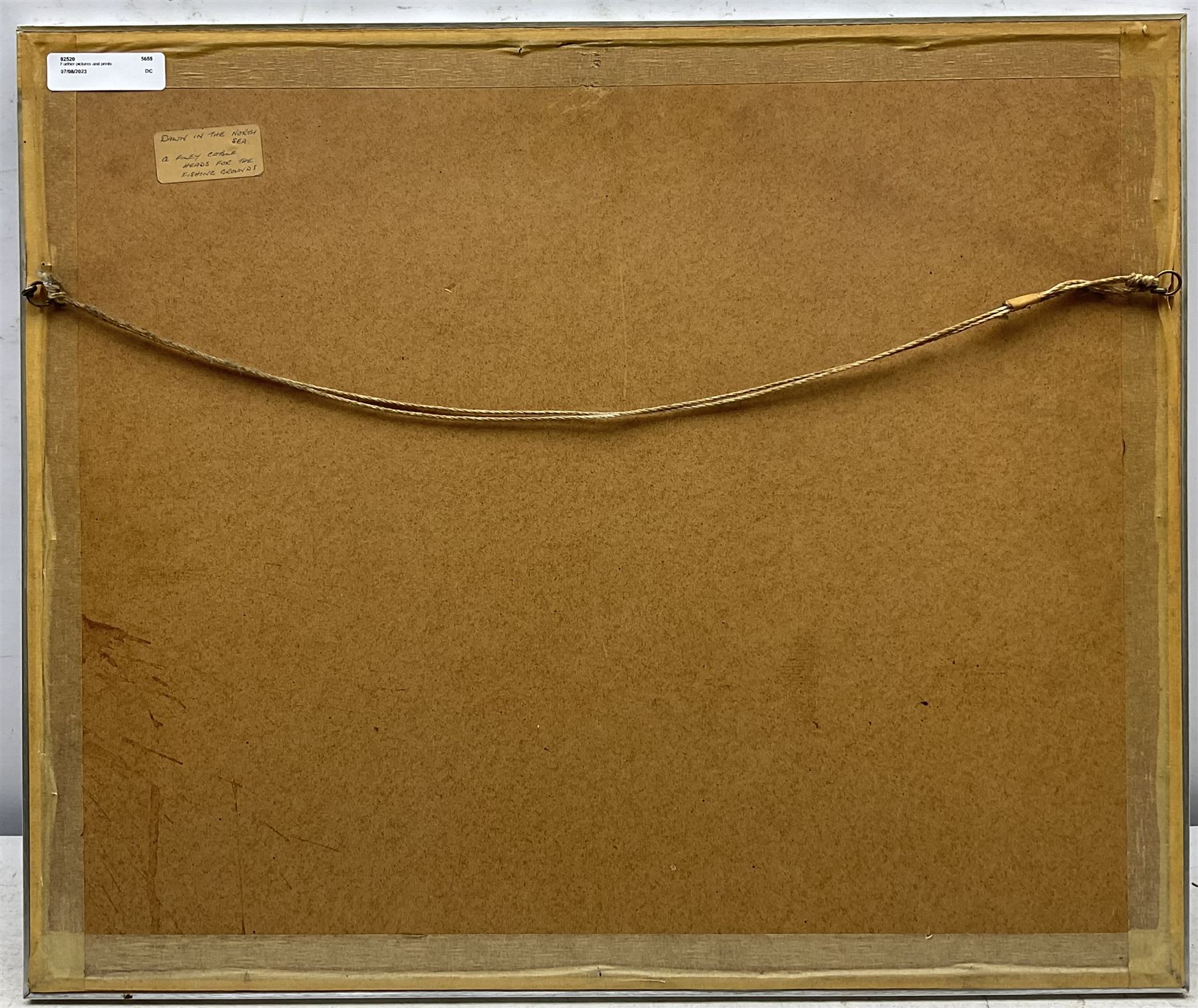 M Whittaker (British 20th Century): 'Dawn in the North Sea - A Filey Coble heads for the Fishing Grounds', watercolour signed and dated 76, titled verso 29cm x 39cm 