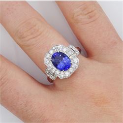 18ct gold oval tanzanite, round and baguette cut diamond cluster ring, stamped 750, tanzanite approx 1.85 carat, total diamond weight approx 0.70 carat