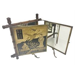Japaneses triptych mirror, with two fold out panels with prints depicting egrets and figures in a garden with Japanese text, within a bamboo frame, H32cm