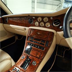 2001 Bentley Arnage Red Label Saloon

Registration: BU51 TGX
Engine: 6.75-litre turbocharged V8 petrol
Transmission: Automatic
Odometer reading: 39,942 miles
Colour: Black Sapphire metallic
Interior: Magnolia leather with burr walnut veneers
Previous owners: 3
V5C: Present
Service history: Good service records

An exceptional Bentley Arnage Red Label Saloon, finished in Black Sapphire metallic, a very dark blue, with a Magnolia leather interior, contrasting dark blue carpets and extensive burr walnut veneers. The car displays an odometer reading of approximately 39,942 miles.

The Arnage Red Label combined Bentley’s renowned 6.75-litre turbocharged V8 engine with automatic transmission, delivering effortless performance in a traditionally appointed luxury saloon. The model is distinguished by its imposing proportions, characteristic Bentley radiator grille and finely crafted interior.

Presented in excellent condition throughout, the bodywork and metallic paint finish appear particularly well preserved, complemented by clean brightwork and the correct Bentley alloy wheels. The engine bay is also notably well detailed.

The interior presents exceptionally well, retaining its Magnolia leather upholstery, polished burr walnut veneers, original factory instrumentation and switchgear. The leather displays only light creasing consistent with careful use.

The car has had three previous owners and is accompanied by good service records.

Features

• 6.75-litre turbocharged V8 petrol engine
• Automatic transmission
• Black Sapphire metallic paintwork
• Magnolia leather interior
• Contrasting dark blue carpets
• Burr walnut veneers
• Electrically adjustable front seats
• Air conditioning
• Factory instrumentation and switchgear
• Bentley alloy wheels
• Right-hand drive
• Odometer reading of approximately 39,942 miles
• Three previous owners
• Good service records
• V5C present

This vehicle forms part of the Estate of the Late John Sills and is offered for sale by the Executors, confirming a genuine reason for sale.