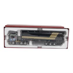 Two Corgi Hauliers of Renown 1:50 scale diecast model lorries, comprising CC14025 Volvo FH Flat Bed & Load RJ & I Monkhouse Ltd and CC13734 Scania R Houghton Parkhouse 'The Professional' Livestock Transporter, both boxed