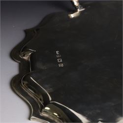 Mid 20th century silver tray, with shaped rim and upon three scroll feet, William Suckling Ltd, Birmingham 1946, D36cm