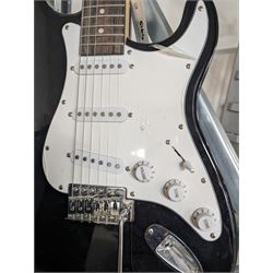 Rock Jam six string electric guitar, together with a Rock Jam amplifier and an Atrics guitar