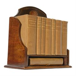 Edwardian Asprey mahogany desktop book trough, the segmental arched back with inlaid fan patera and serpentine shaped sides, above single recess and moulded base rail, housing Asprey & Co Ltd leather bound reference library, comprising Dictionary, French and English Dictionary, English Quotations and Proverbs, Classics and Mythology, Encyclopedia, French and Latin Quotations, Gazetteer, and Atlas, book trough, 22cm x 22.5cm x 11cm
