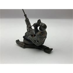 German Lineol Flak Artillery Gun on revolving base H11cm; four other Lineol WW2 German soldiers; and three Elastolin German soldiers including reclining radio operator (8)