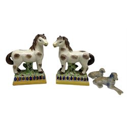 Pair of 20th century Staffordshire style figures of horses, H18cm, together with pair of recumbent dog figures