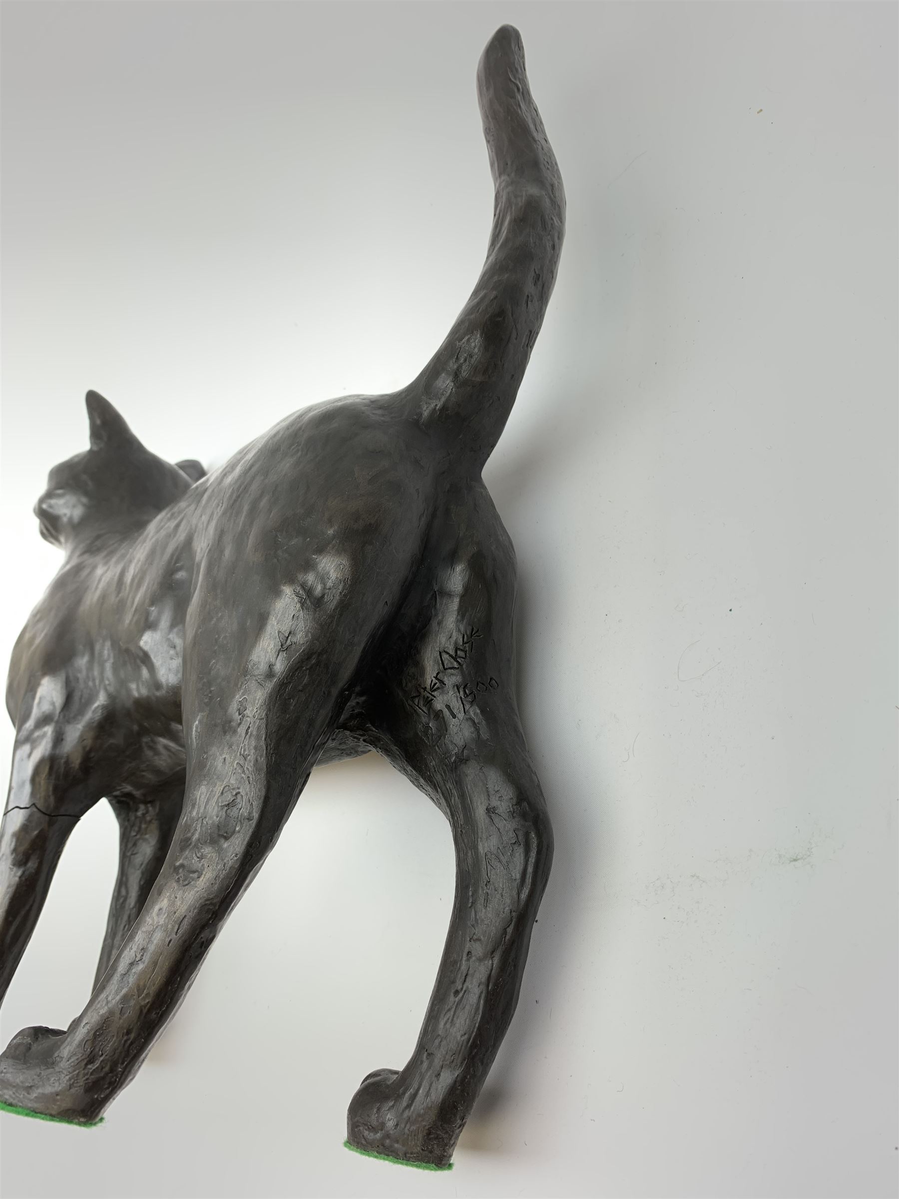 A large limited edition bronzed model of a cat, signed Peter Close 271/500, H42cm.