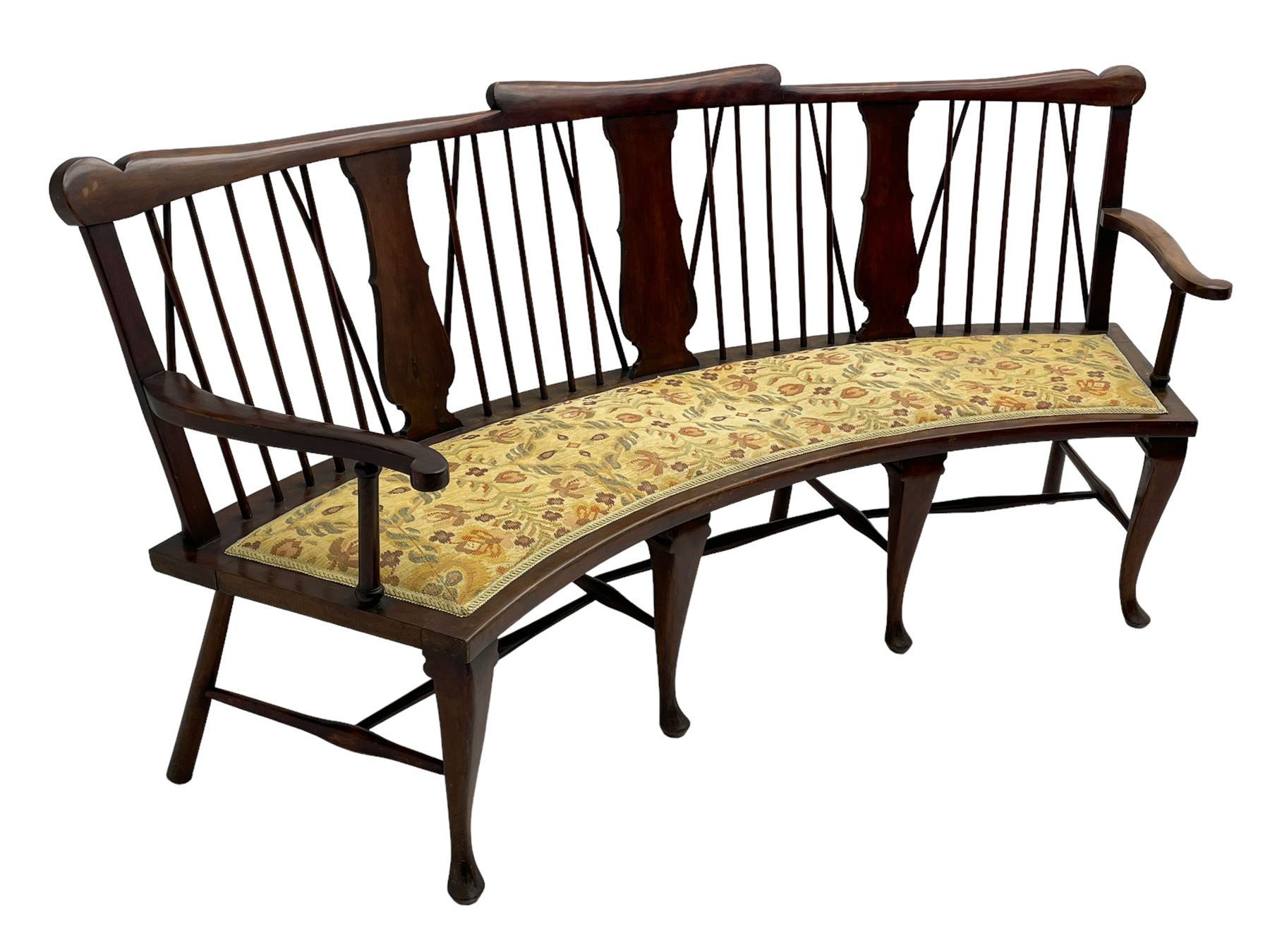 Georgian design curved Windsor settee or settle, shaped cresting rail over triple vase shaped splats and stick back, upholstered seat, on cabriole front supports joined by a series of swell turned stretchers