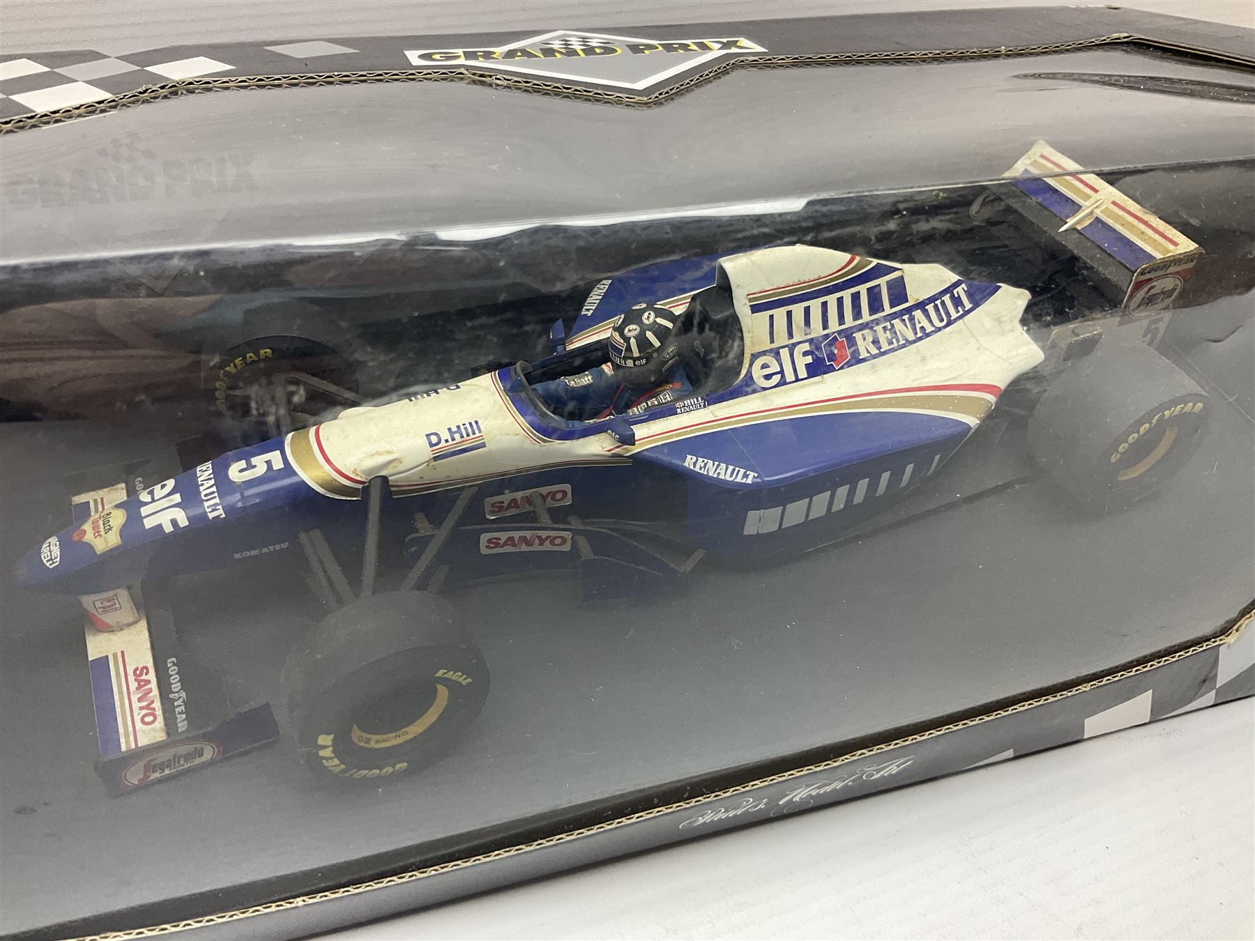 Three Paul's Model Art Grand Prix 1:18 scale die-cast racing cars - Williams Renault FW17 D. Hill; Ferrari 412 T1 J. Alesi; and Ligier Honda JS41 M. Brundle; all boxed (3)