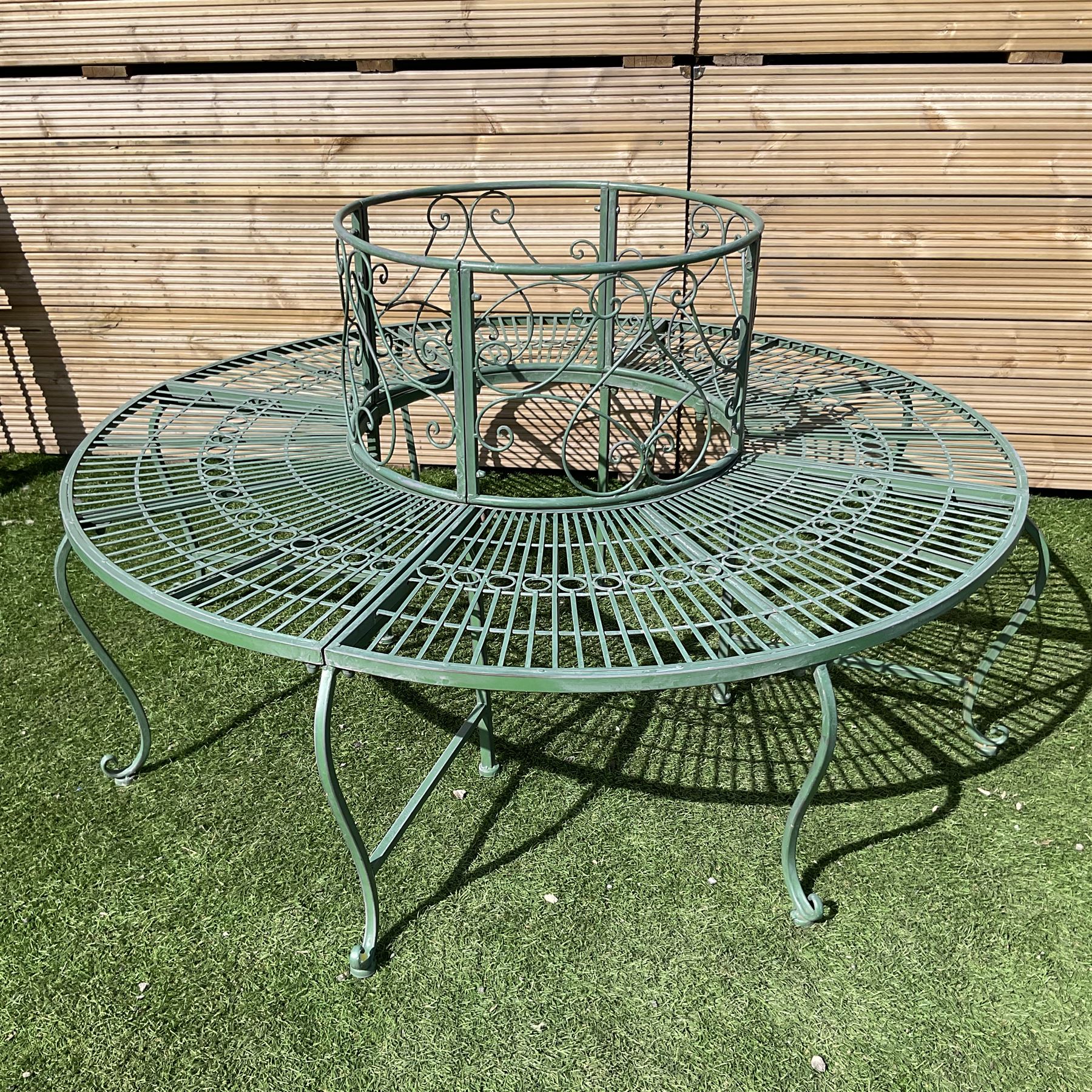 Regency design full tree bench, the scrolled back over strap seat with circular decoration, on cabriole front supports - THIS LOT IS TO BE COLLECTED BY APPOINTMENT FROM DUGGLEBY STORAGE, GREAT HILL, EASTFIELD, SCARBOROUGH, YO11 3TX