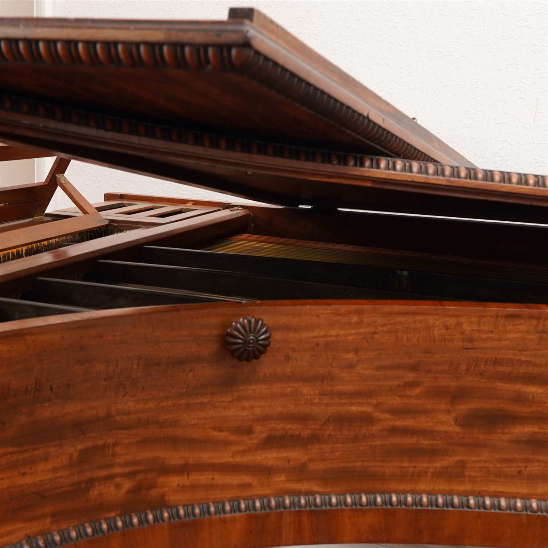 Early 19th century Grand Piano by John Broadwood & Son, London 1828.
Straight strung Broadwood “Barr Frame” Grand Piano with four steel braces from the wrest plank to the brass hitchpin plate. Partially re-strung with one string missing and some tuning pins loose, bridges in good condition, soundboard with cracks, action requires some adjustment and attention, six octave keyboard, with 73 keys C1-C7, with ivory naturals and ebony sharps, Lyre with sustain and una-chorda pedals, mahogany case with brass inlay and makers name to the double key-fall, adjustable open lattice music desk with egg and dart moulding to the surround of the case and lid, raised on reeded and tapered legs with castors. 

 You can find and listen to examples of Alan Cuckston playing this particular Broadwood Grand Piano in the links below:
Trio in D Minor Op. 25 by Francis Edward Bache
Gladiolus Rag by Scott Joplin
Sonata for Violin and Piano No.1 in G Minor by George Frederick Pinto

Given the intricate nature of these historic instruments, specialist support will be available if required, to assist successful buyers with safe removal and onward handling. Price upon application. 


This item has been registered for sale under section 10 of the APHA Ivory Act Submission Reference: 1N7BA84E
