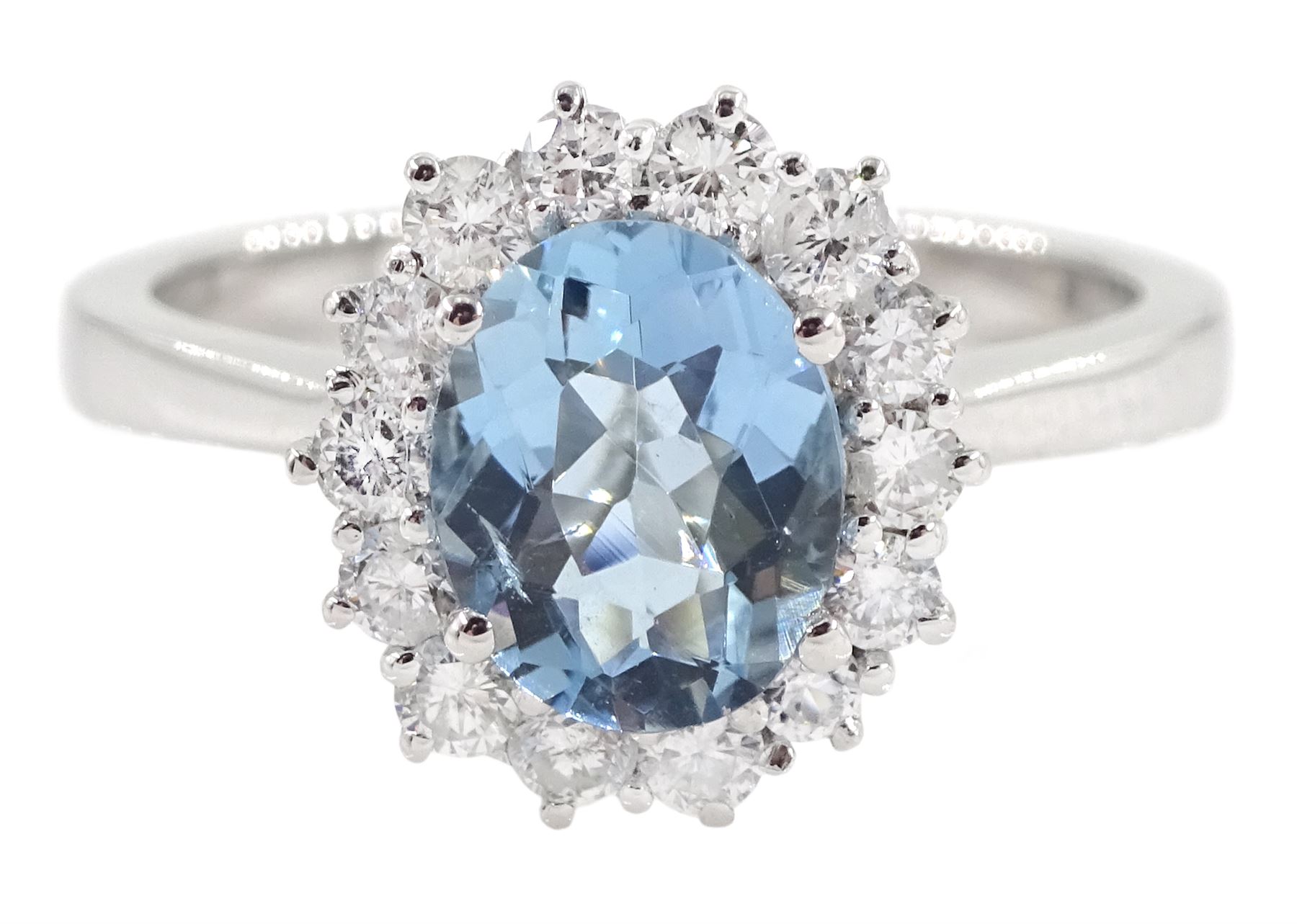 18ct white gold oval aquamarine and round brilliant cut cluster ring, hallmarked, aquamarine approx 1.05 carat, total diamond weight approx 0.40 carat