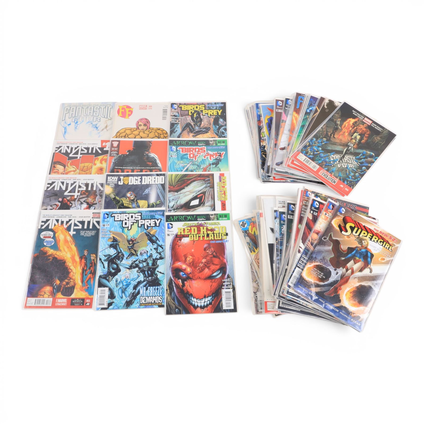 Sixty-three modern DC and Marvel comic books, including Fantastic Four, Red Hood and the Outlaws, Justice League of America, Justice League Canada, Justice League United, Judge Dredd, Birds of Prey, Forever Evil and Wonder Woman comic books, together with six 1979 Wonder Woman comic books (69)