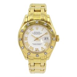 Rolex Oyster Perpetual Datejust Pearlmaster, ladies 18ct gold automatic wristwatch, Ref. 80318, serial No. P190714, white dial with Roman numerals, with diamond set bezel, boxed with additional link and guarantee dated 2001