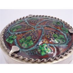 Modern silver box, of circular form, the cover mounted with an an Arts & Crafts enamel panel of a fruiting vine by H G Murphy, circa 1920, hallmarked Jon Braganza, London 2018, H4.5cm D8cm, approximate gross weight 7.84 ozt (244 grams)

Henry George Murphy was a silversmith and jeweller known for his work in the Arts & Crafts and Art Deco styles. This enamel panel was acquired in the dispersal sale of Murphy's Falcon Studios at 58 Weymouth St, Marylebone, and is also featured in Paul Atterbury and John Benjamin's book Arts and Crafts to Art Deco The Jewellery and Silver of H G Murphy (page 29).

 