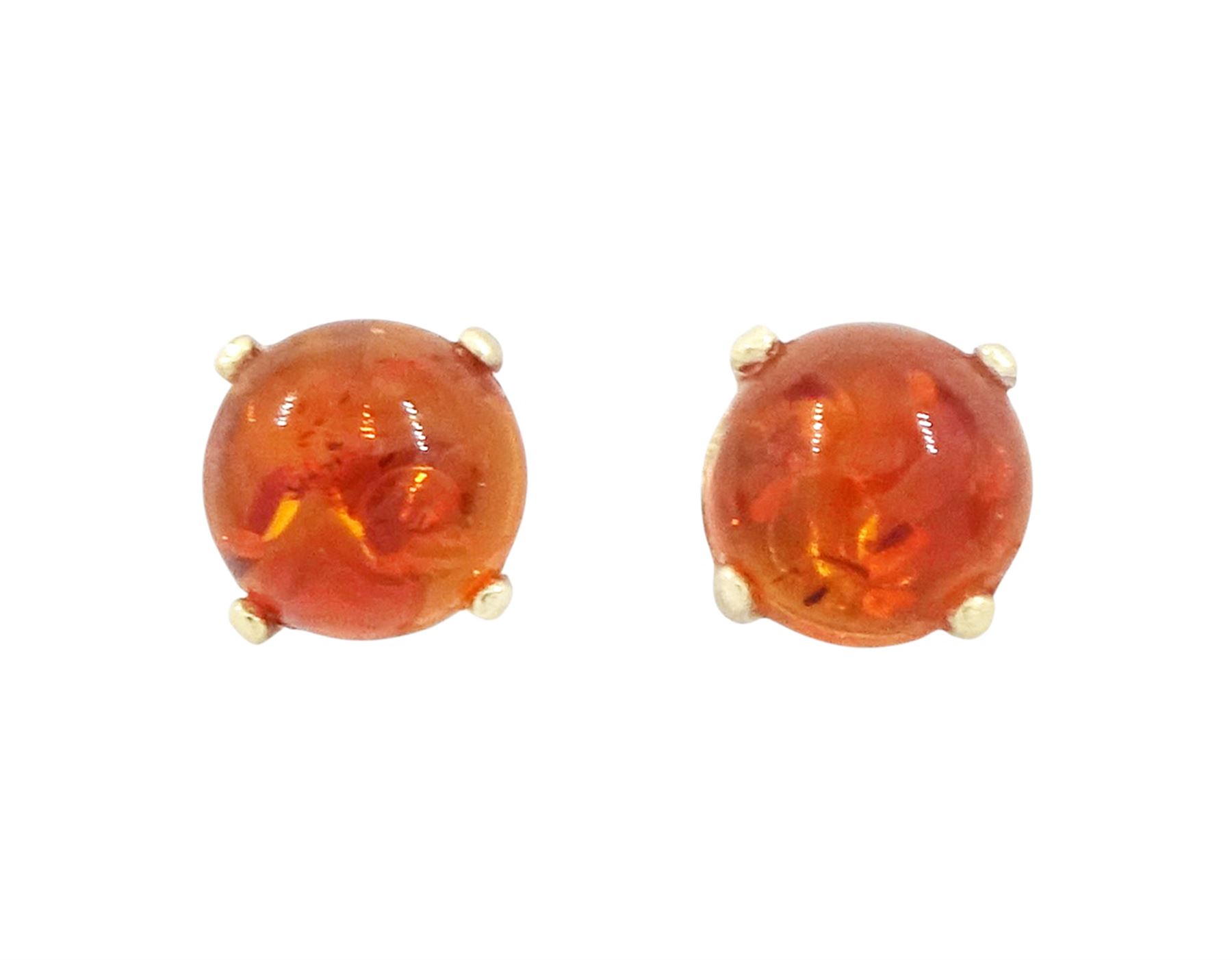 Pair of 9ct gold amber stud earrings, stamped
