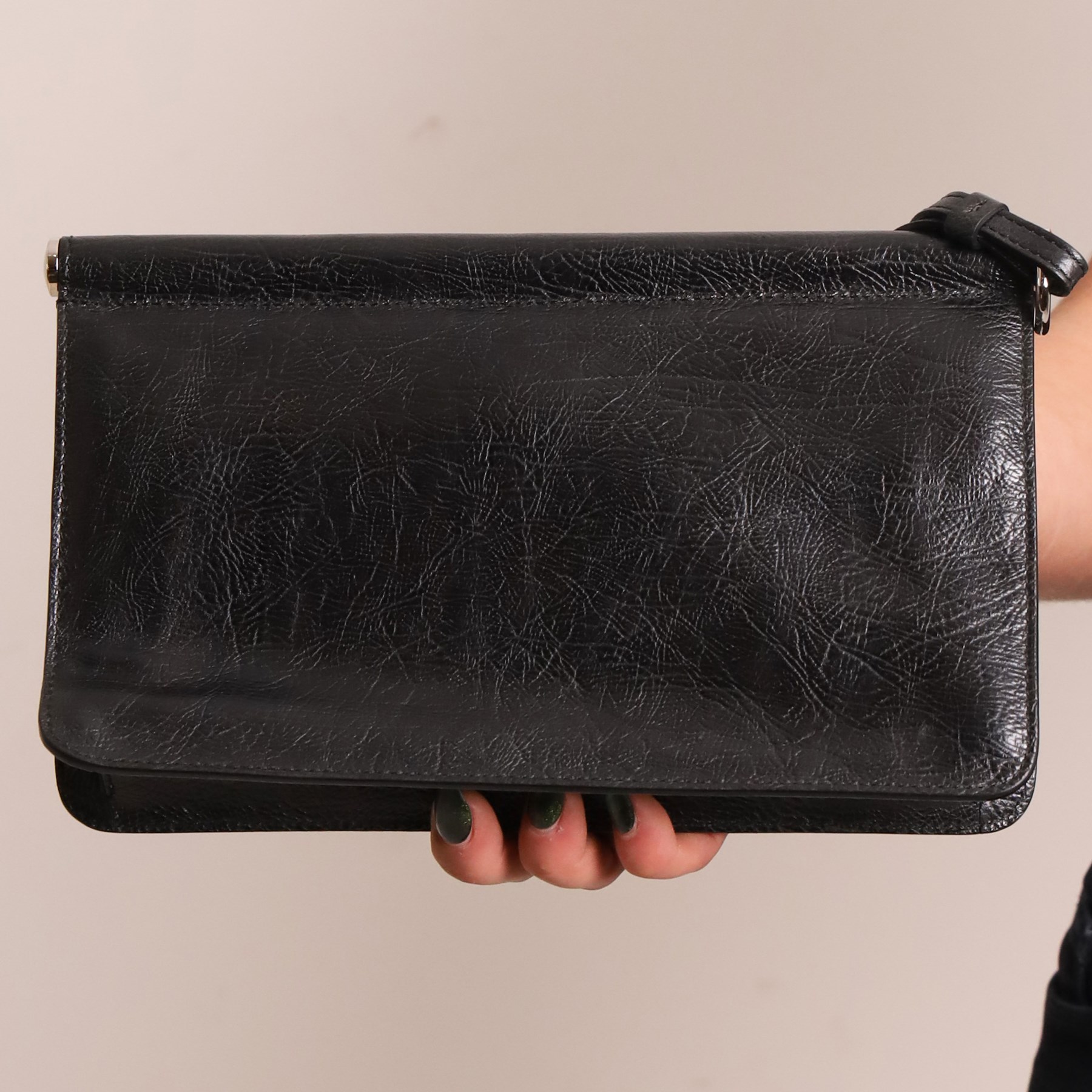 Tod’s - Fashion Pochette Piccola in Nero crinkled patent leather, the rectangular body with rolled-bar top, detachable wrist strap, flap front and silver-tone branded toggle fastening, with original product tag and dust bag