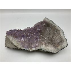 Amethyst crystal geode cluster, with well-defined crystals of various sizes, H13cm, L46cm