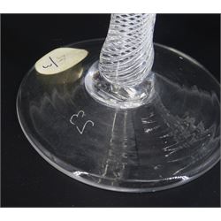 18th century ale glass, the funnel bowl raised upon a single series air twist double knopped stem and conical foot, H20cm, together with a similar smaller drinking glass, H15.5cm