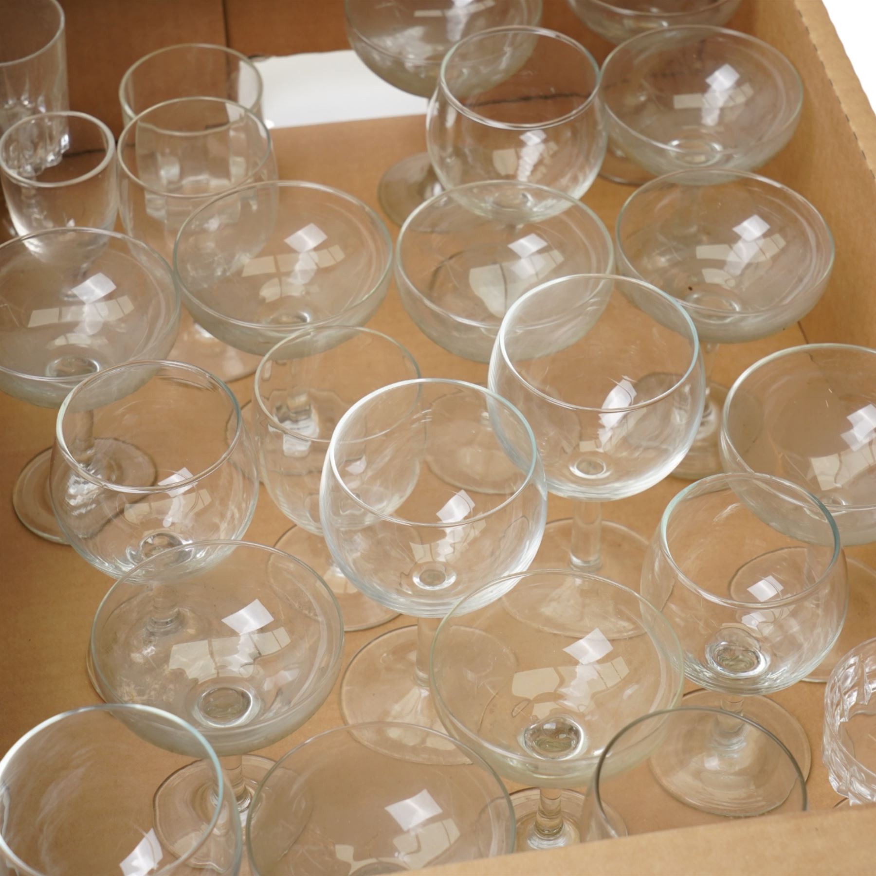 Quantity of table glass including champagne saucers, wine glasses etc