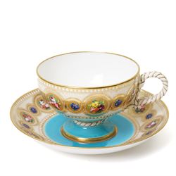 Brown-Westhead, Moore & Co cabinet cup and saucer, with rope twist moulded handle, hand-painted with floral reserves against a white and sky blue ground, heightened profusely with gilt, together with a pink hand-painted example, and a 19th century spill vase and twin-handled covered sucrier (4)