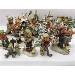 Large collection of Christmas themed Hummel figures and Hummel scapes by Goebel, to include Winter Friend, Making New Friends, Tree Trimming Time, Winter Adventure etc