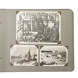 WWII photo album of Malta containing original photographs with annotations, including Battle ships, harbours, soldiers and buildings, together with Manual of Naval Cookery 1945 Naval book