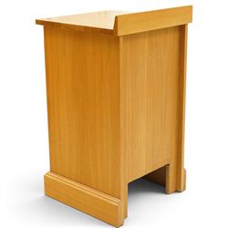 Unicornman - craftsman made oak bedside cupboard, raised back over panelled cupboard, on skirted base applied with carved unicorn signature, by Geoff Gell of Coxwold