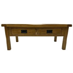 Contemporary medium oak coffee table, rectangular top fitted with two drawers, on square supports