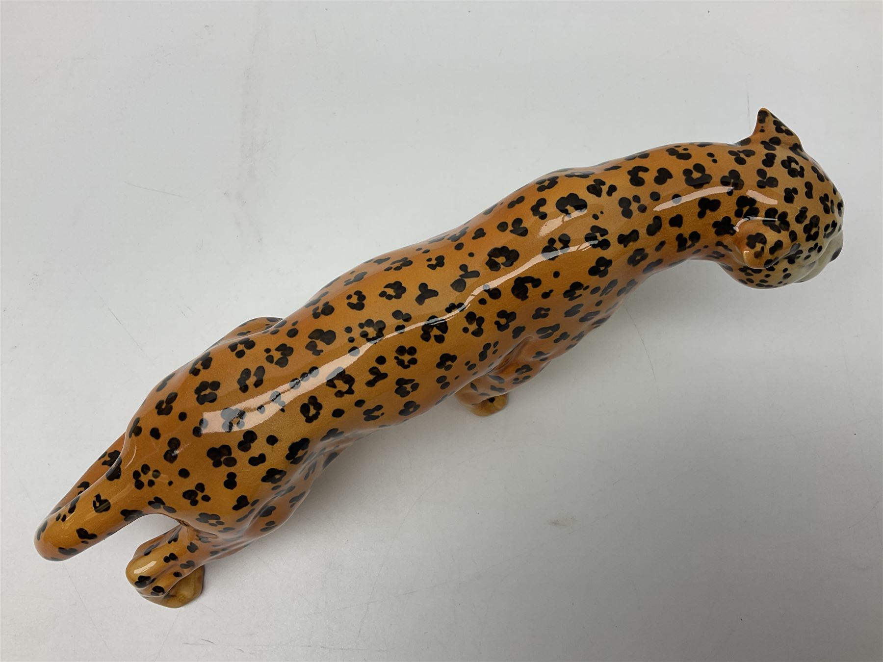 Group of Beswick figures to include leopard no 1082, rabbits, swan, pheasant no 1226 etc, all with marks beneath