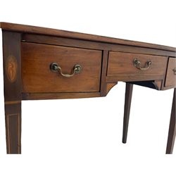 Edwardian mahogany dressing side table, raised back on bow front top with satinwood band, fitted with three drawers, inlaid with shell and fan motifs, square tapering supports