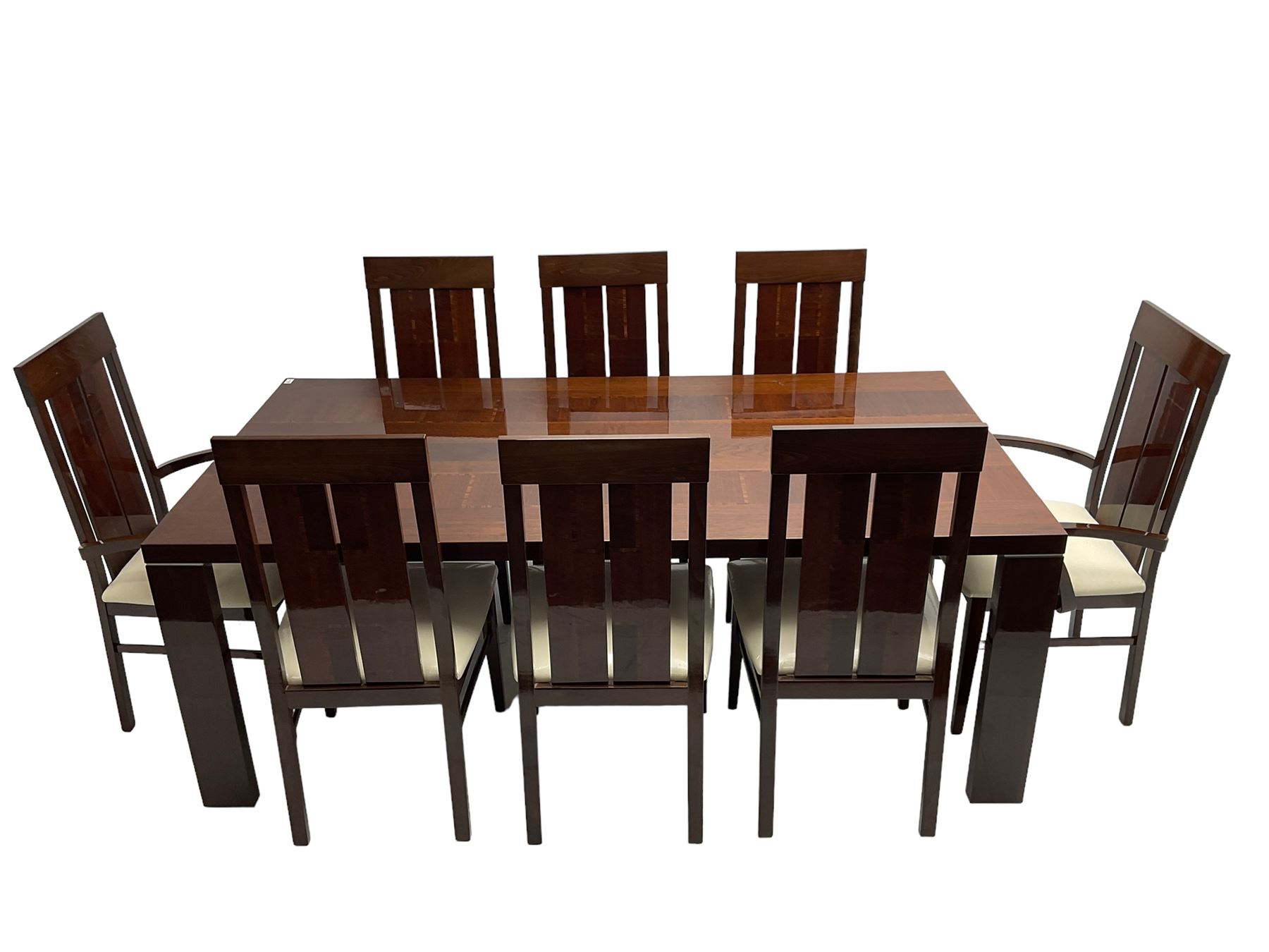 Large American walnut rectangular dining table on square block supports, together with set eight high back dining chairs with cream upholstered seats, the top and chair backs with matching inlaid geometric banding