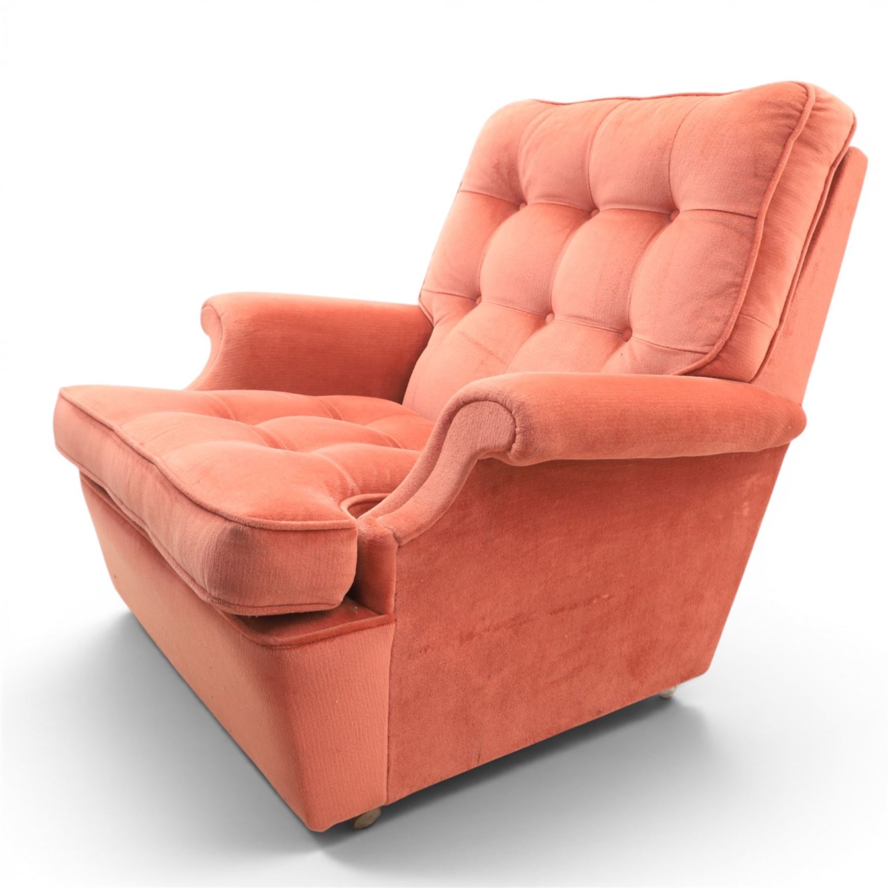 Parker Knoll - mid-century armchair suite, 'Model N30' recliner armchair with headrest and deep buttoned seat and back raised on castors, a wide armchair with deep button back and seat raised on castors, a wingback chair with flared scrolled arms, raised on cabriole supports