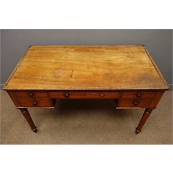  19th century mahogany writing desk, centre drawer stamped, 'W Willamson & Sons Guildford', four smaller drawers, turned tapering supports, W122cm, H74cm, D66cm  