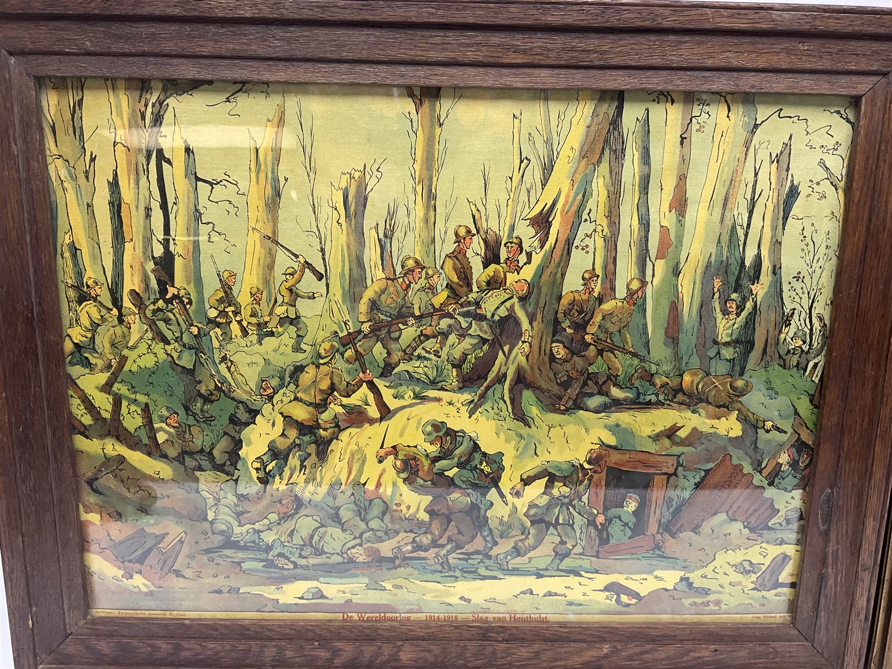 WW1 chromolithograph print of a battle scene with French and German soldiers in a wood, entitled 'De Wereldoorlog 1914-18 Slag Van Houthulst' 35 x 49cm, oak frame; and a framed WW1 regimental testimonial to 49744 Pte. E. Jagger KOYLI, gilt frame (2)