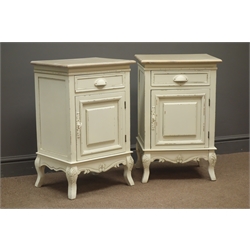  Pair French style painted bedside chests, single drawer above cupboard door, shaped apron, fleur de lis carved cabriole legs, W45cm, H70cm, D35cm  